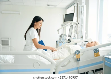 caring nurse communicates postoperative patient 260nw 2371490957